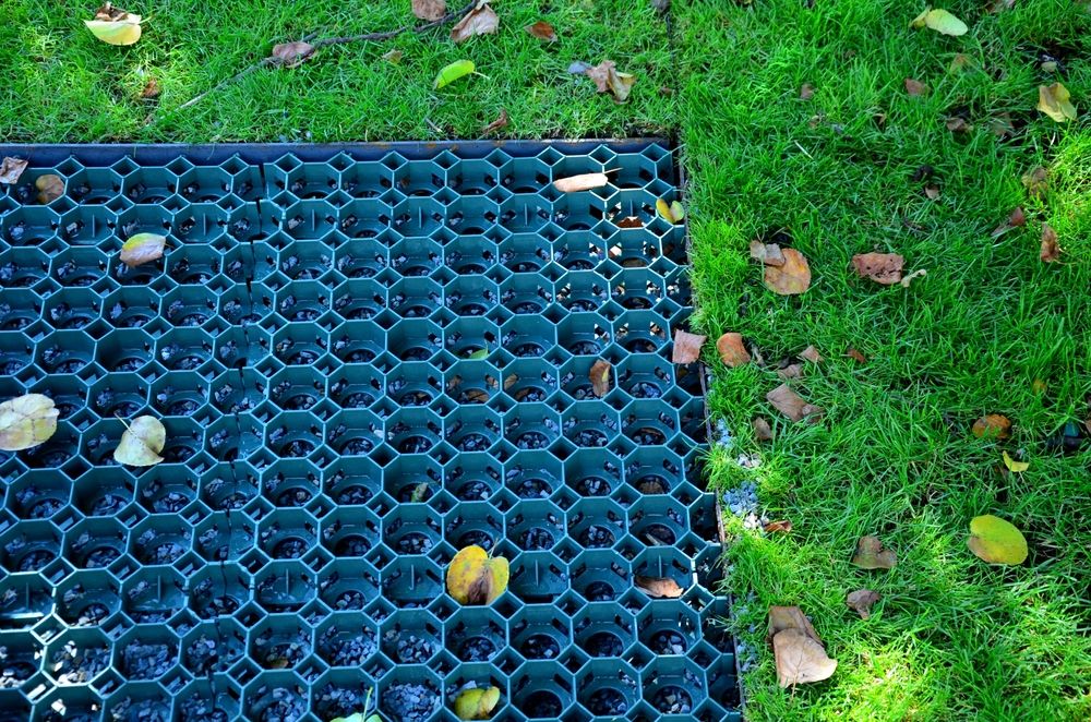 Installation,Of,A,Plastic,Mat,As,A,Substitute,For,Lawn.