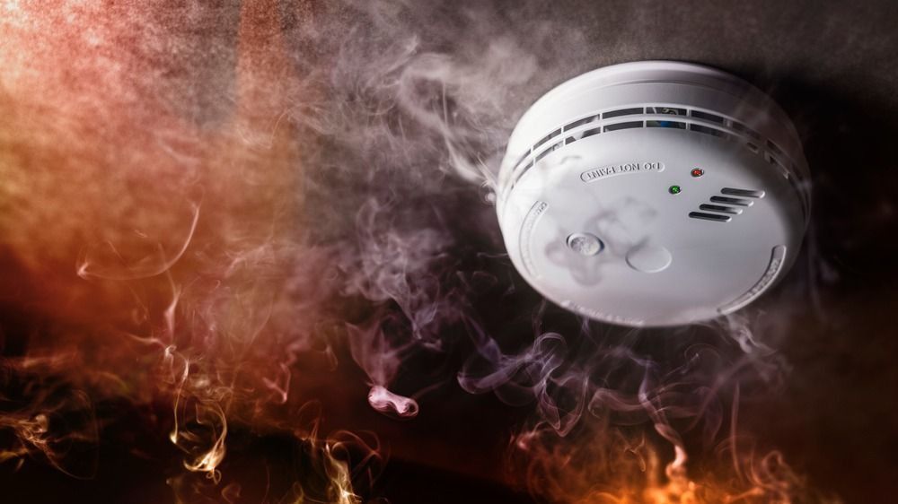Smoke,Detector,And,Fire,Alarm,In,Action,Background,With,Copy
