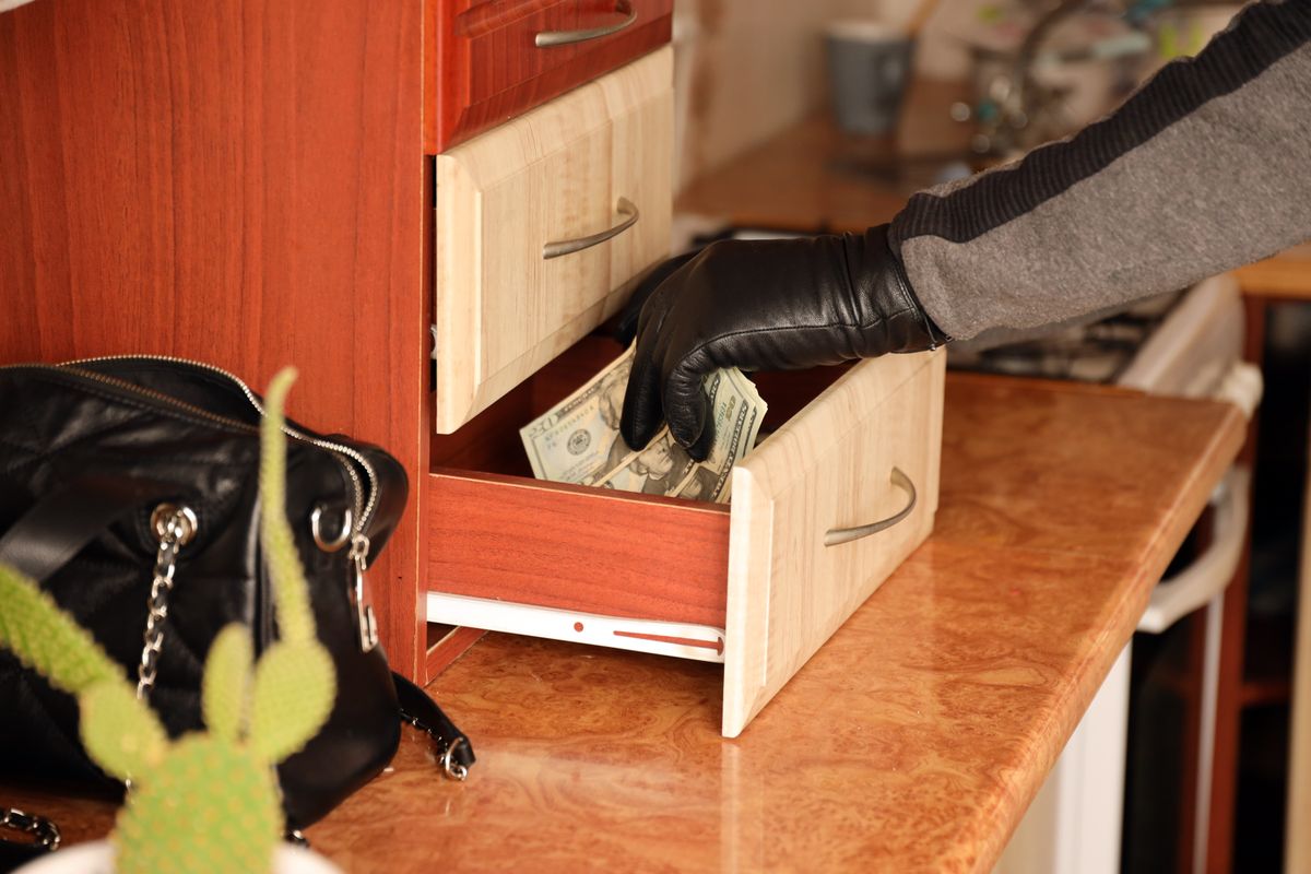 Robber,In,Black,Outfit,And,Gloves,See,In,Opened,Shelf