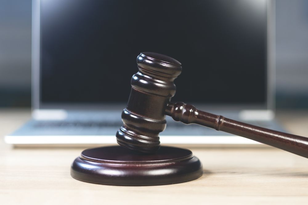 NAV árverés, Judge,Hammer,For,Adjudication,With,Wooden,Stand,And,Laptop,On