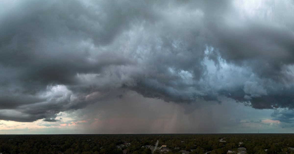 Landscape,Of,Dark,Ominous,Clouds,Forming,On,Stormy,Sky,Before