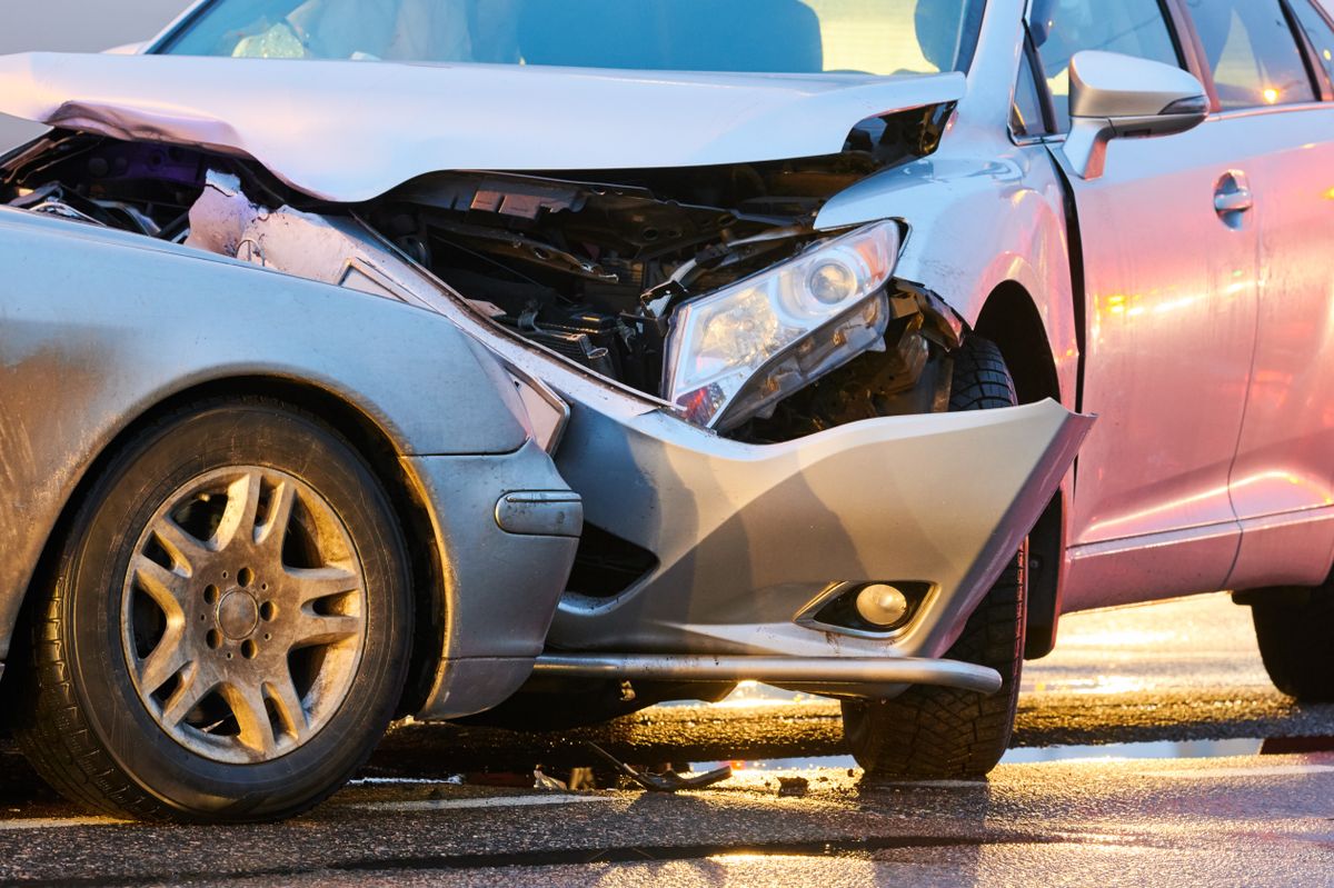 Car,Collision,Accident,On,Street.,Two,Cars,Crashed,In,Front