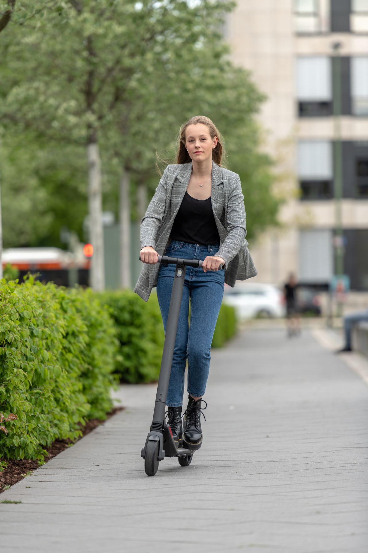 E,Scooter,On,A,Bike,Path,In,The,City